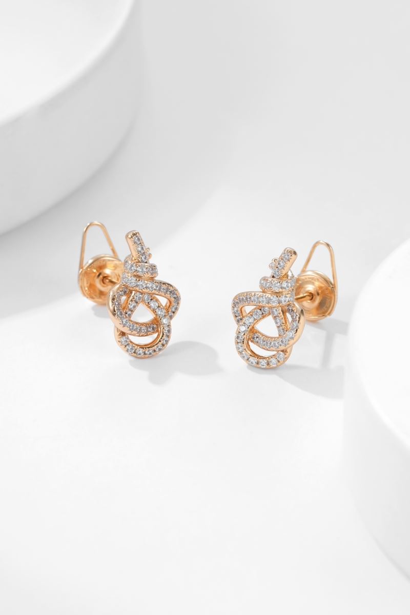 T*f*ny earrings